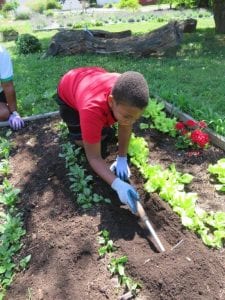 student in garden