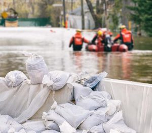 sandbags on the side of the road during a flooding event