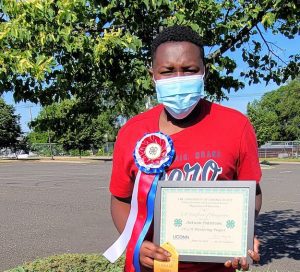 Antwon with his 4-H mentoring awards