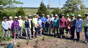 master gardener volunteers in front of a garden