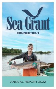 woman holding a fish, CTSG logo