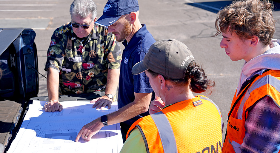 people looking at a map