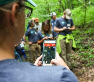 GIS class attendees in the woods