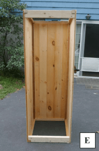 A view of a partially constructed interrior of a smokehouse.