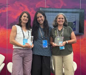 Cary and Emily posting with their ESRI Story Map awards.